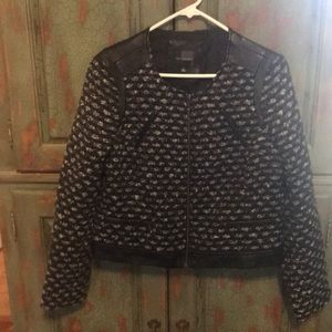 Black Tweed and Leather waist length jacket.